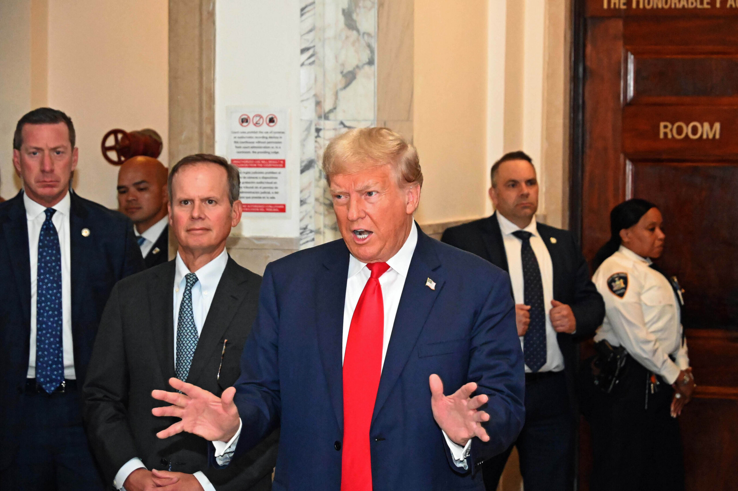 (NEW) The fraud trial of Donald Trump at 60 Center Street, New York City, New York, U S, October 3, 2023. It consists of Attorney General Letitia James briging a $250 million dollar civil law suit against Trump  for committing repeated fraud by inflating his assets to get better loans and insurance policies.

Photo: Donald Trump outside court room.
Credit: Victor M. Matos/Thenews2